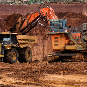 An excavator loads raw nickel ore into a dump truck at a nickel mining site of Vale in Sorowako, South Sulawesi province, Indonesia, March 29, 2023. REUTERS/Ajeng Dinar Ulfiana